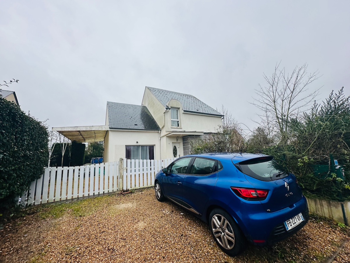 Exterior enhancement before/after with blue sky and blurred license plate